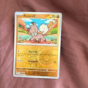 Rockruff Pokémon Card with Scenic Artwork